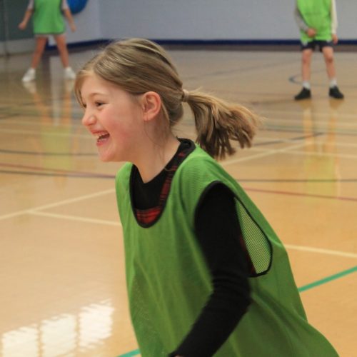 girl playing sports